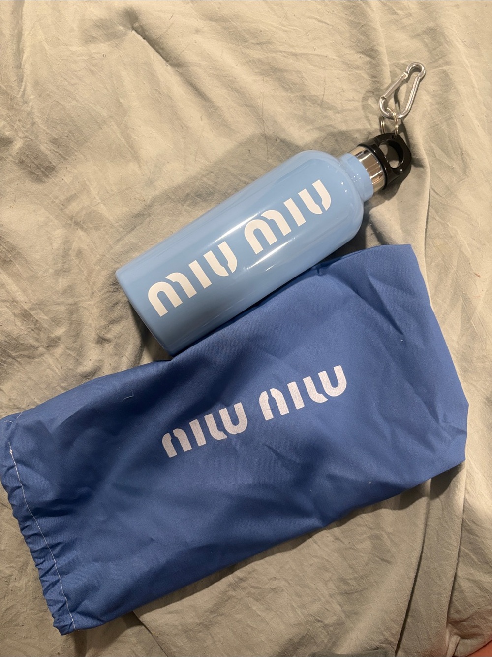 Miu miu blue water bottle